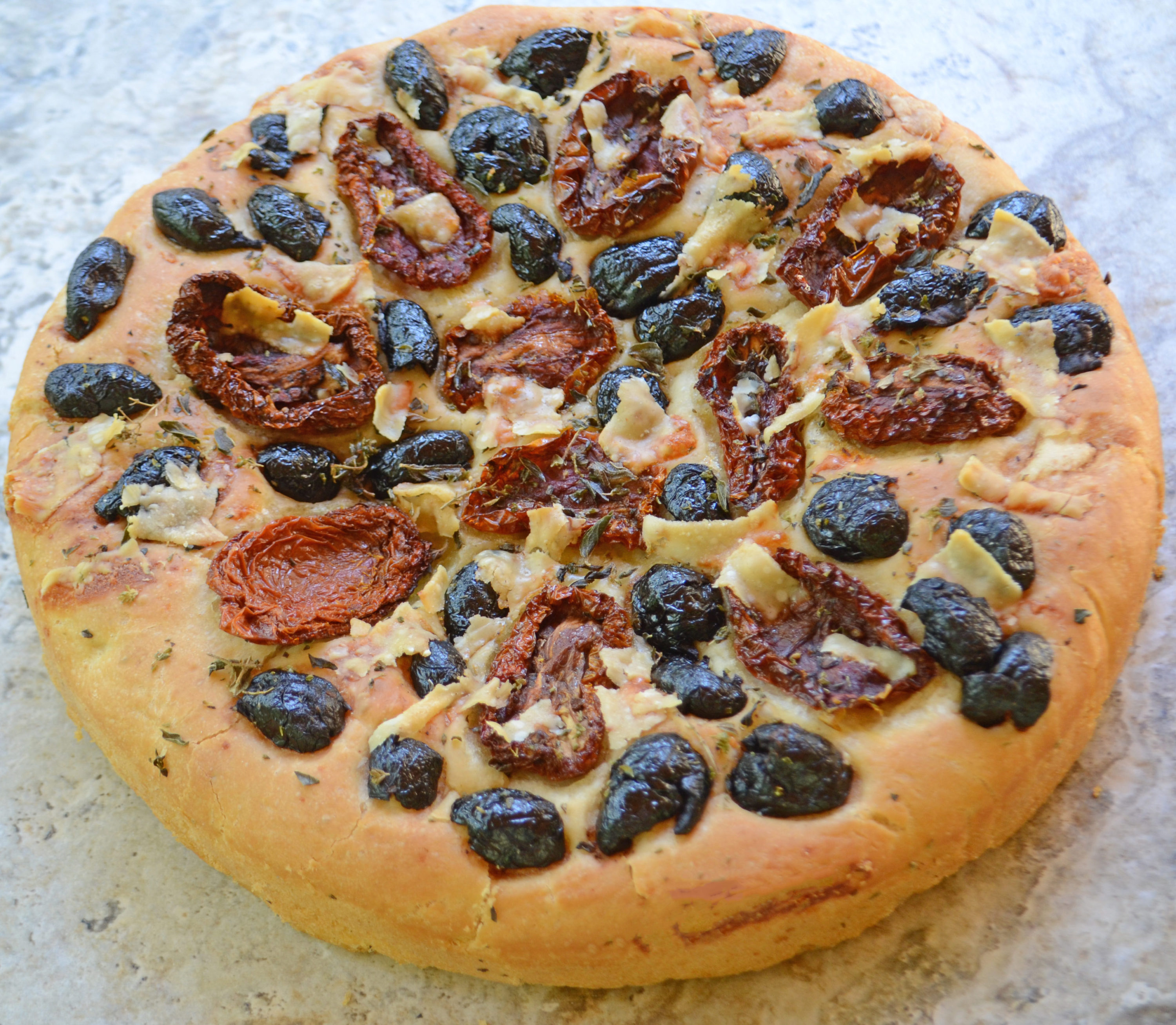 Sfincione(Focaccia) with Sundried Tomatoes, Olives, and Anchovies